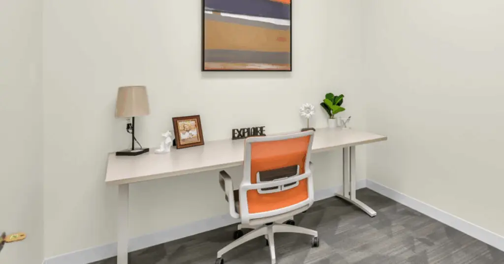 Private office workspace with desk and chair at Strive Coworking Workspaces in Cypress, Texas