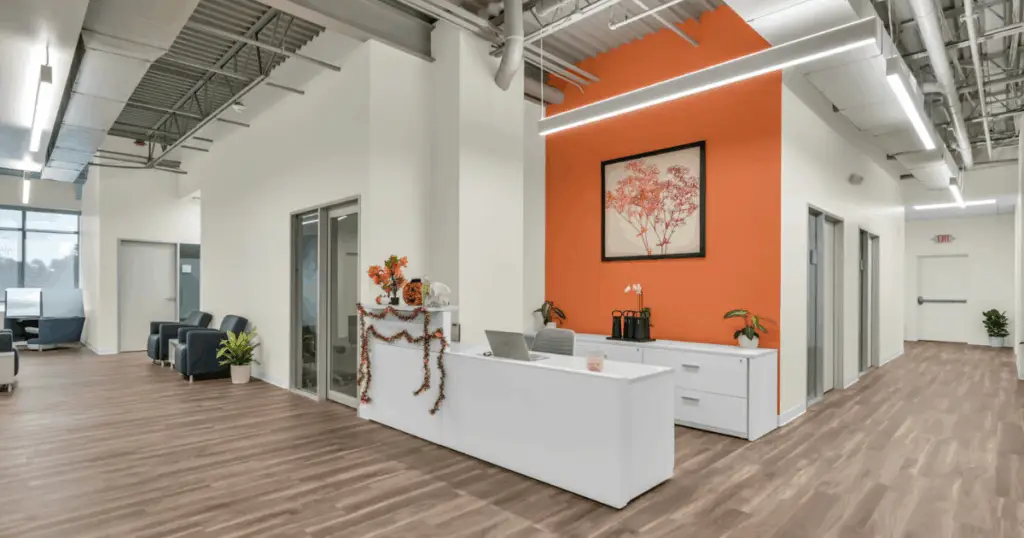 Front reception and coworking workspace entrance at Strive Coworking Workspaces in Cypress, Texas