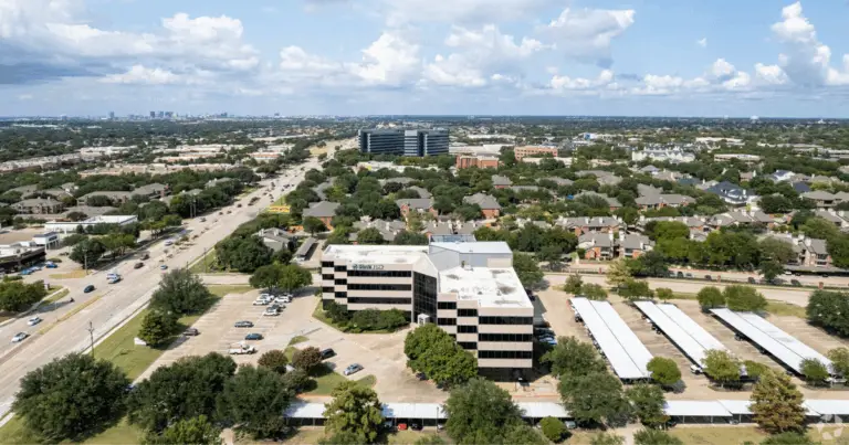 Strive Workspaces Plano office building on Preston Road with surrounding neighborhood and city views.