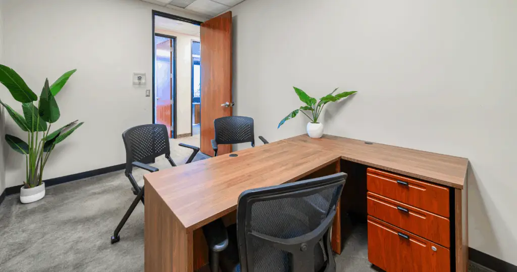 Plano private office space at Strive Workspaces featuring private furnished office with workspace and seating.