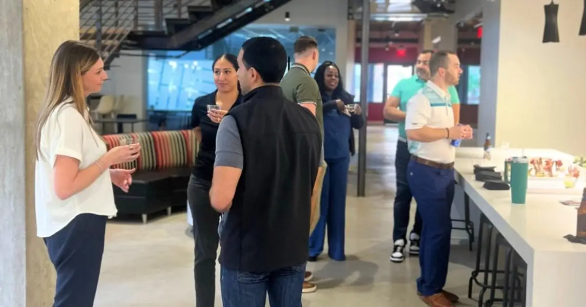 coworking space community connecting at a member event